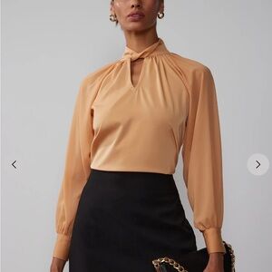 Long sleeve twisted neck blouse